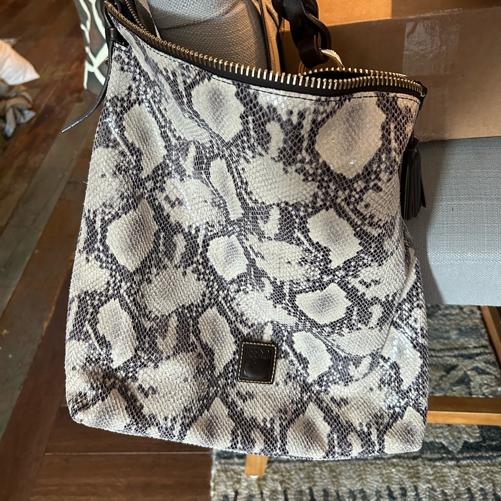 EUC. Dooney & Burke hobo handbag in super soft pliable snakeskin leather.